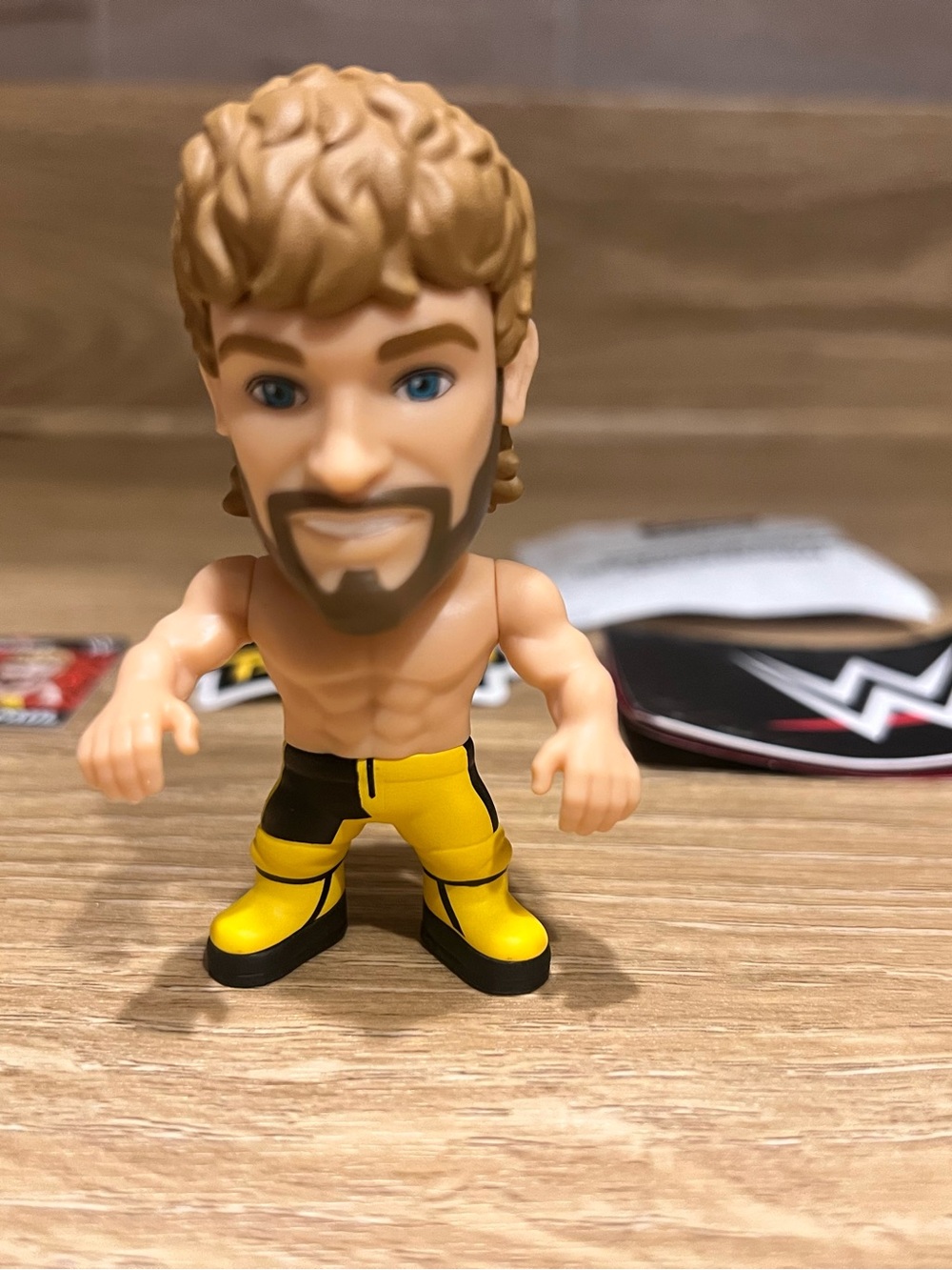 Zuru WWE: Logan Paul - Mini Suprise Figure in Yellow and Black Wrestling Gear